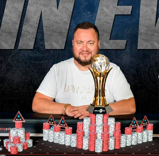 Гия с кубком partypoker LIVE